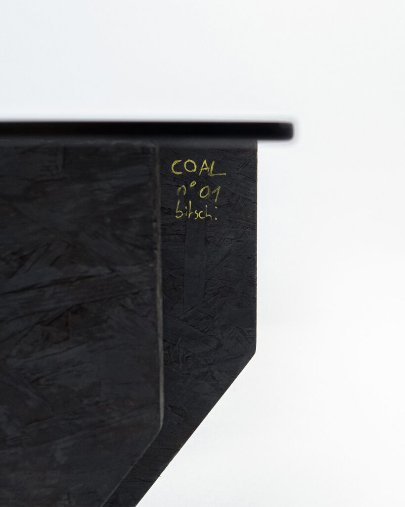 Coal coffee table by Arthur Bitsch, designed in 2024, made from burnt OSB and smoked glass.