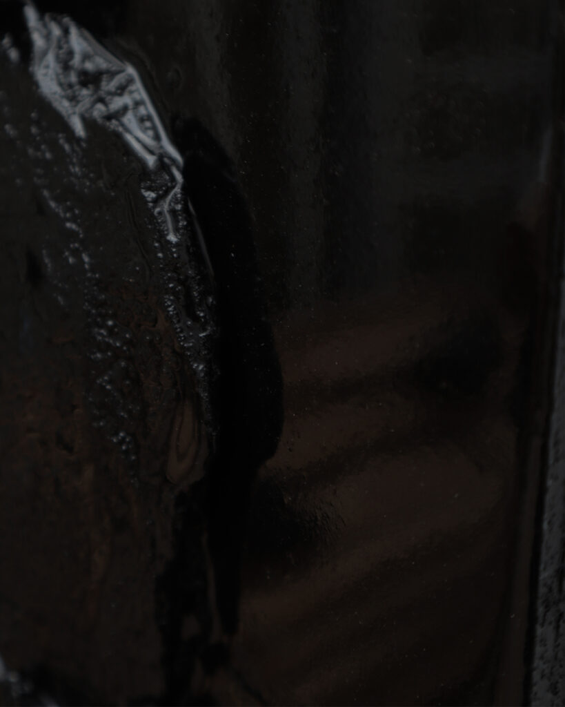 Faun bas-relief by Arthur Bitsch, created in 2025, made of MDF and 3D-printed PETG, coated with Dark Matter, exploring the concept of nigredo.