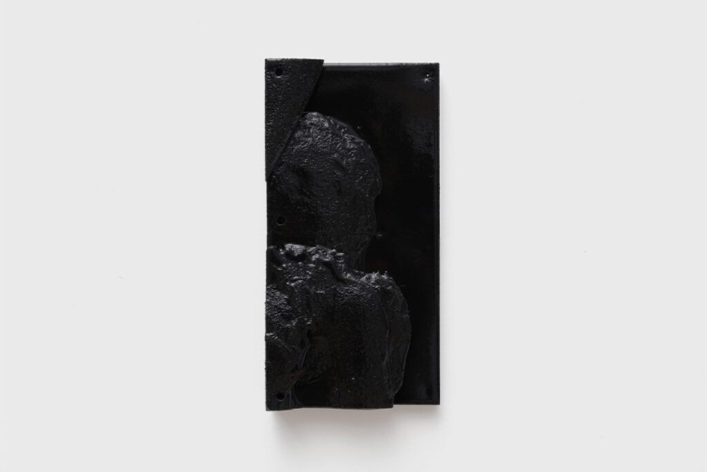 Faun bas-relief by Arthur Bitsch, created in 2025, made of MDF and 3D-printed PETG, coated with Dark Matter, exploring the concept of nigredo.