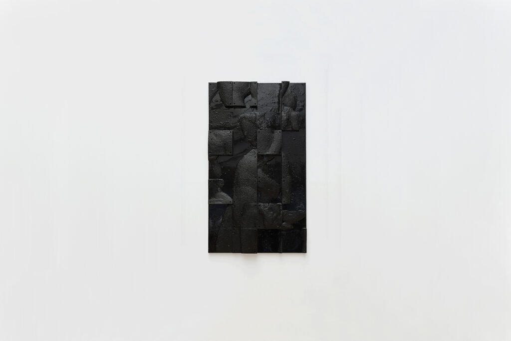 Dionysos bas-relief by Arthur Bitsch, created in 2026, made of MDF and 3D-printed PETG, coated with Dark Matter, exploring the concept of nigredo.