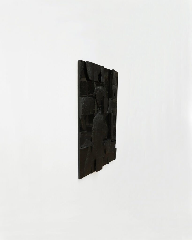 Dionysos bas-relief by Arthur Bitsch, created in 2026, made of MDF and 3D-printed PETG, coated with Dark Matter, exploring the concept of nigredo.