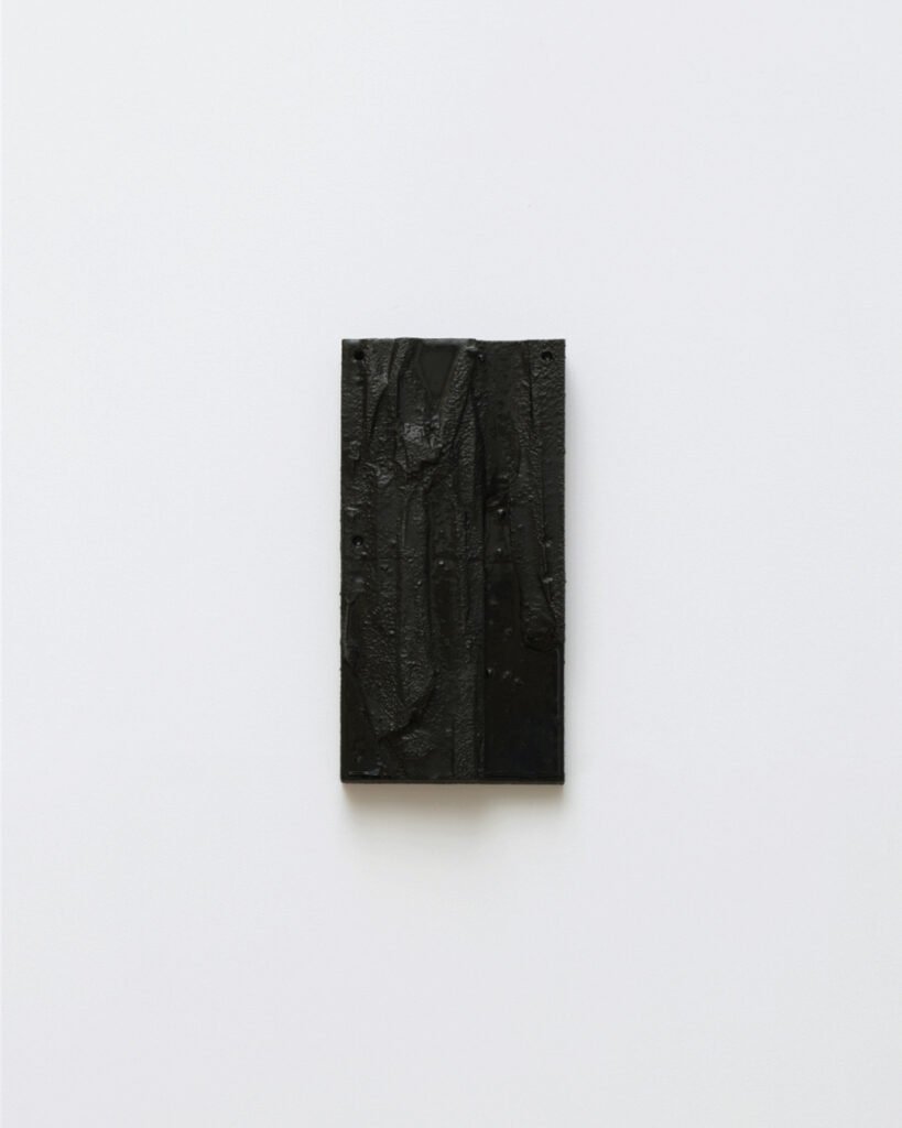 Pallium bas-relief by Arthur Bitsch, created in 2026, made of MDF and 3D-printed PETG, coated with Dark Matter, exploring the concept of nigredo.