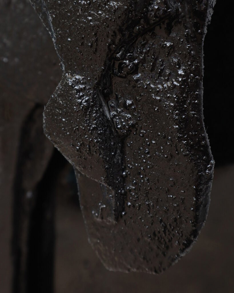 Qeshet bas-relief by Arthur Bitsch, created in 2026, made of MDF and 3D-printed PETG, coated with Dark Matter, exploring the concept of nigredo.